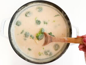 Add broccoli into the potato soup.