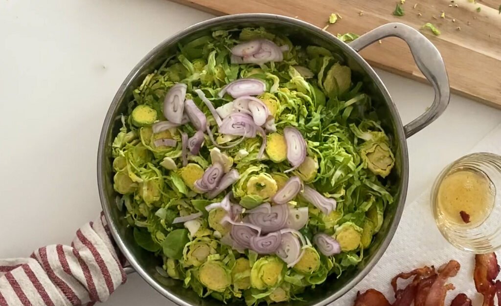 Brussel Sprouts Bacon Blue Cheese Salad with a Balsamic Reduction