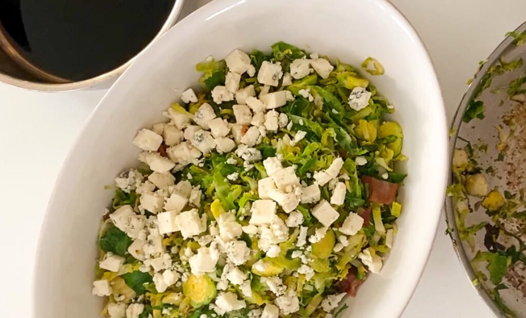 Brussel Sprouts Bacon Blue Cheese Salad with a Balsamic Reduction