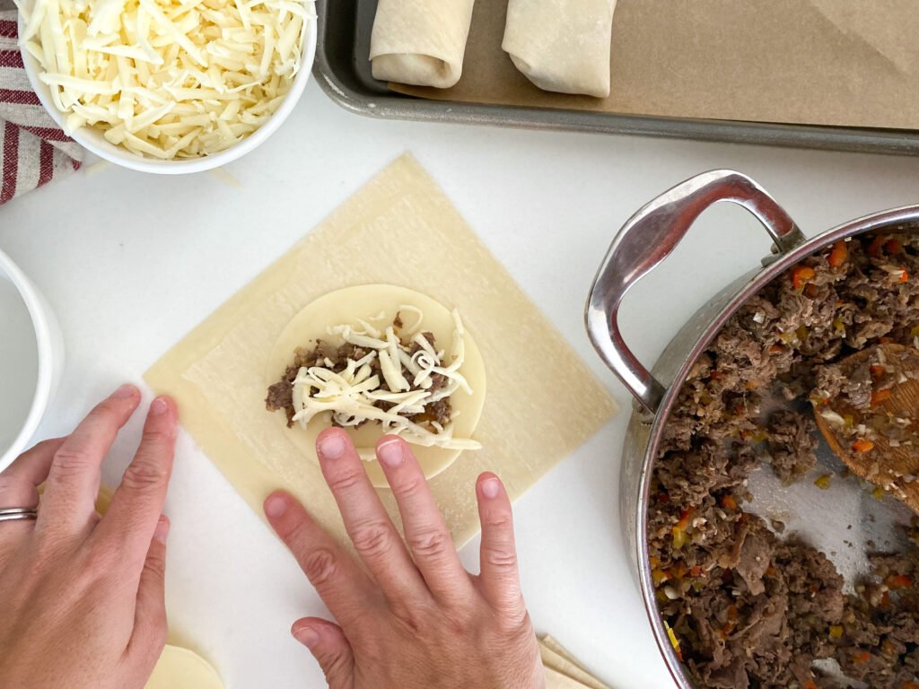 Philly cheesesteak egg rolls - process cheese filled