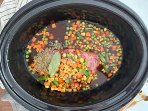 vegetable beef soup in a crockpot