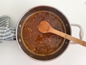 Deglazing the pan with chicken stock