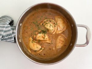 Pierogies in Dijon mustard sauce