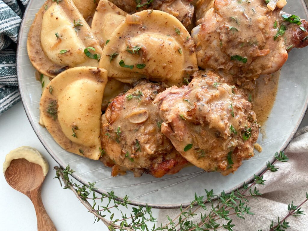 Chicken with Dijon mustard and pierogies - close up