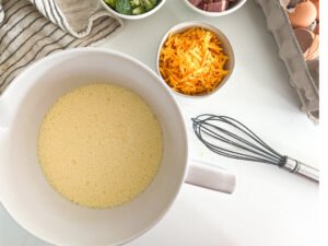 Eggs and milk whisked together