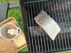 Honey Lemon Grilled Salmon face down on the grill