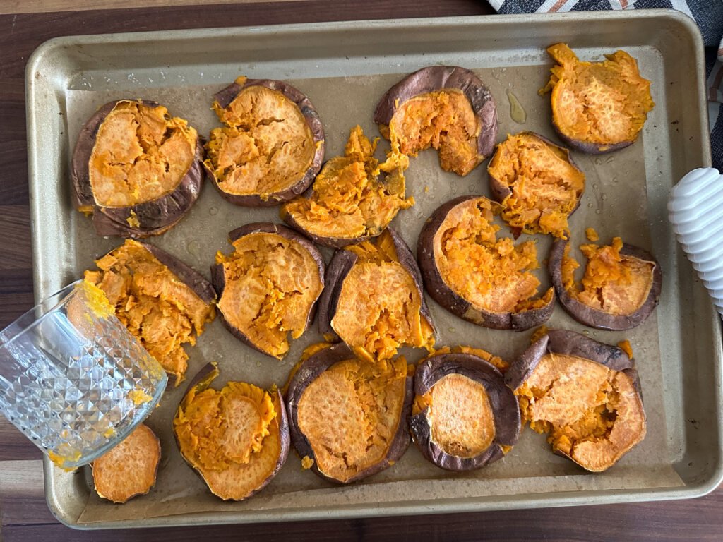 Sheet-Pan Candied Sweet Potatoes - prep smashed with a glass