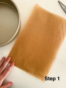1. Take a piece of parchment paper and fold in half.