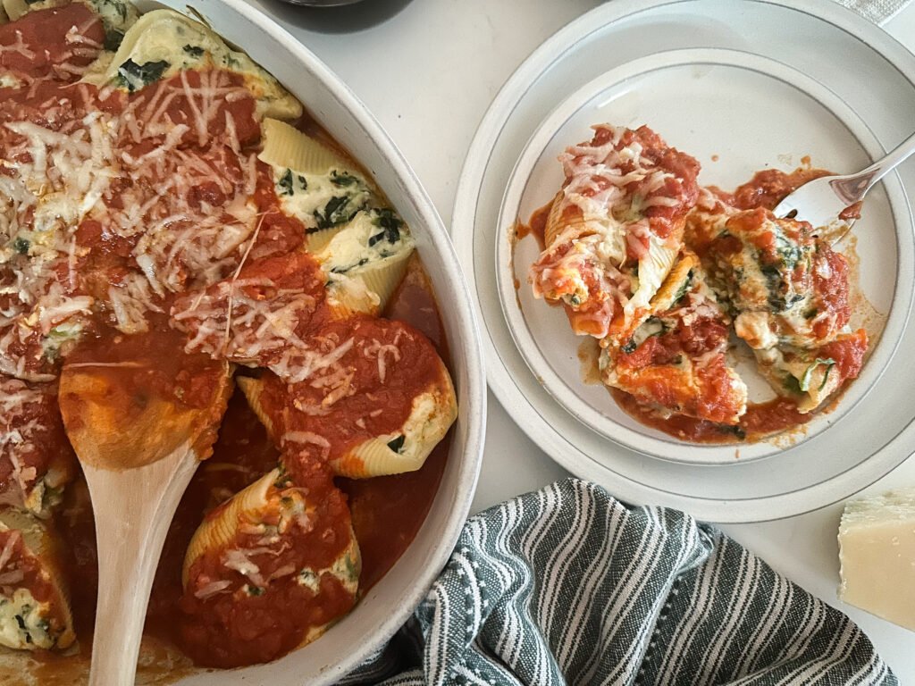 Spinach Stuffed Shells (in a spicy Arrabbiata Sauce) dished out