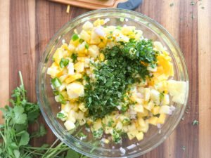 Chopped cilantro on top of the prepared salsa
